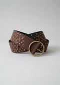 Brown belt with gold studs and a large gold buckle