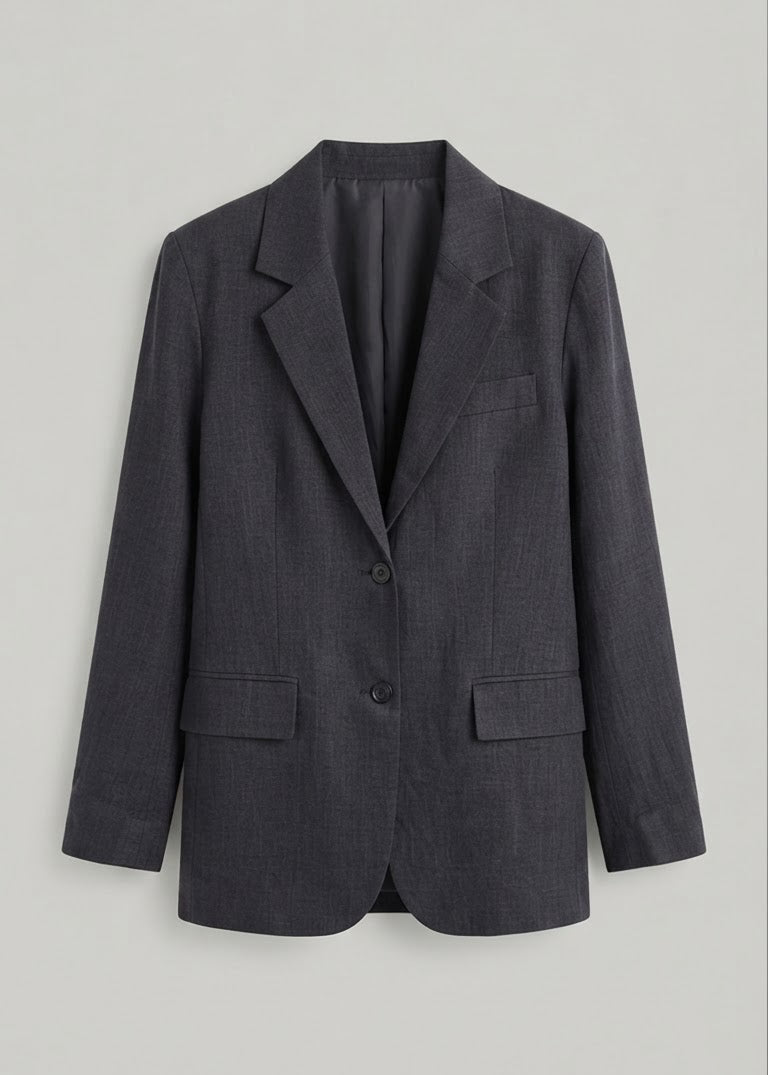 A dark charcoal gray blazer with a subtle textured weave, featuring notch lapels, two front buttons, and flap pockets, displayed against a neutral light gray background.