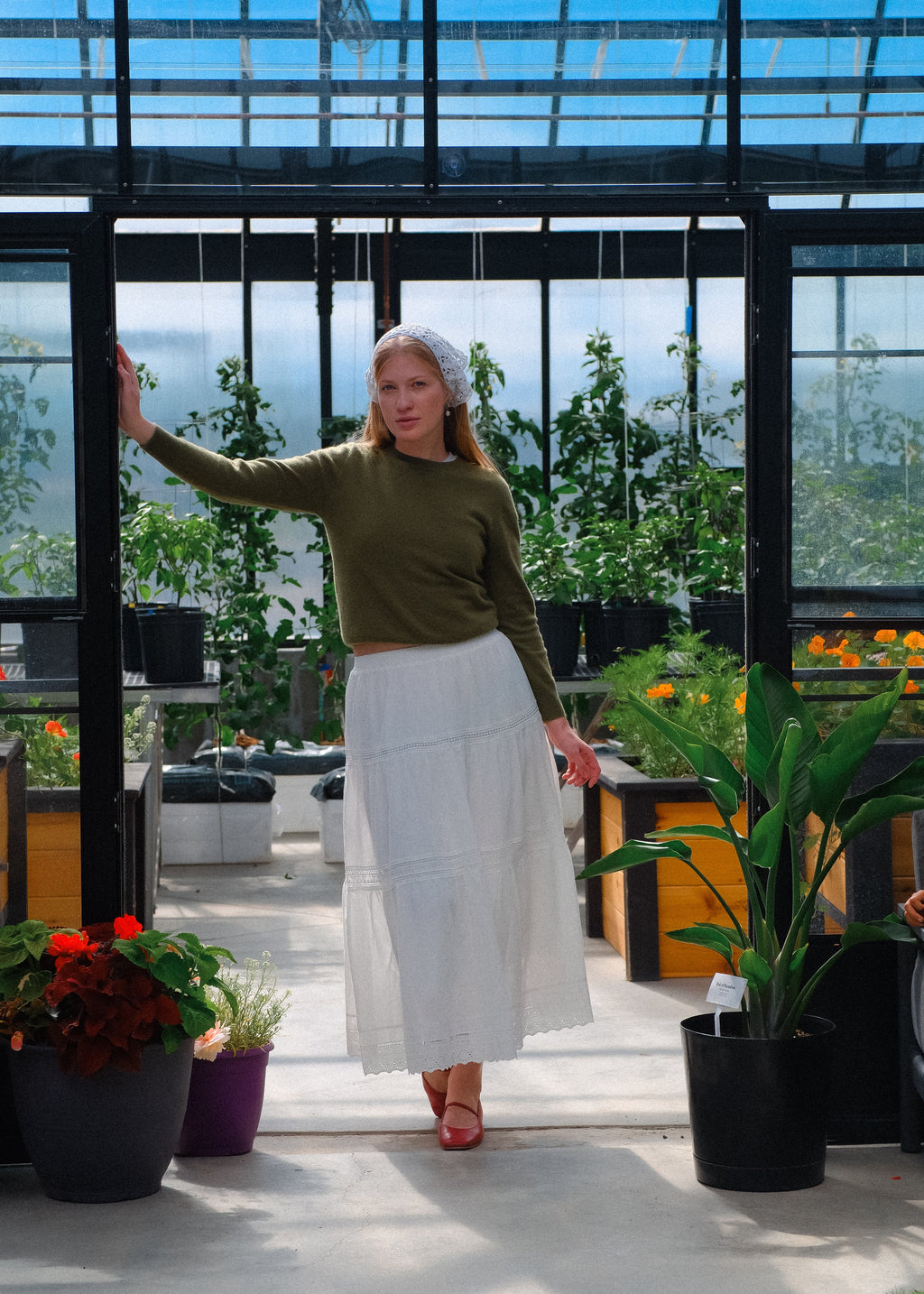 The woman in the greenhouse