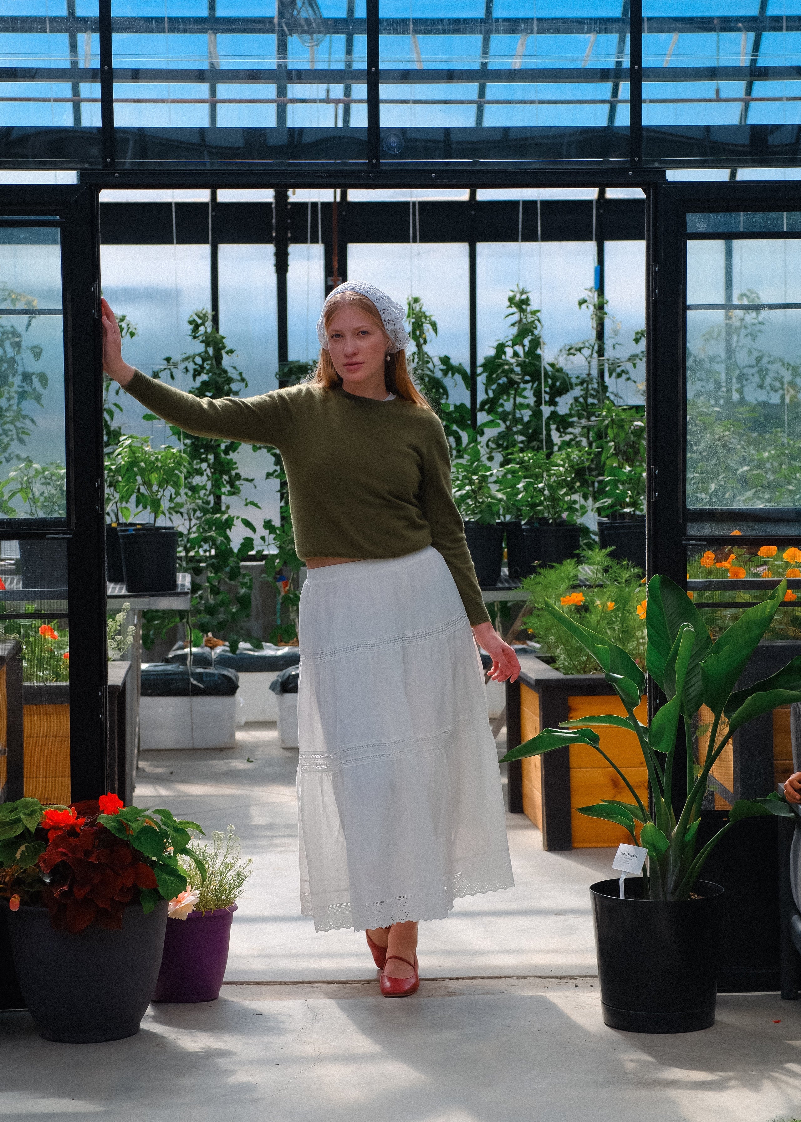 The woman in the greenhouse